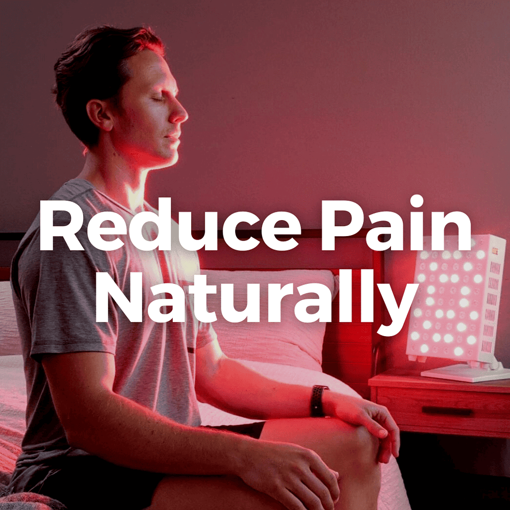 A person relaxes on a bed, using a red light therapy device to naturally reduce pain.
