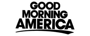 A silhouette of a person with arms raised against a gradient sky background.