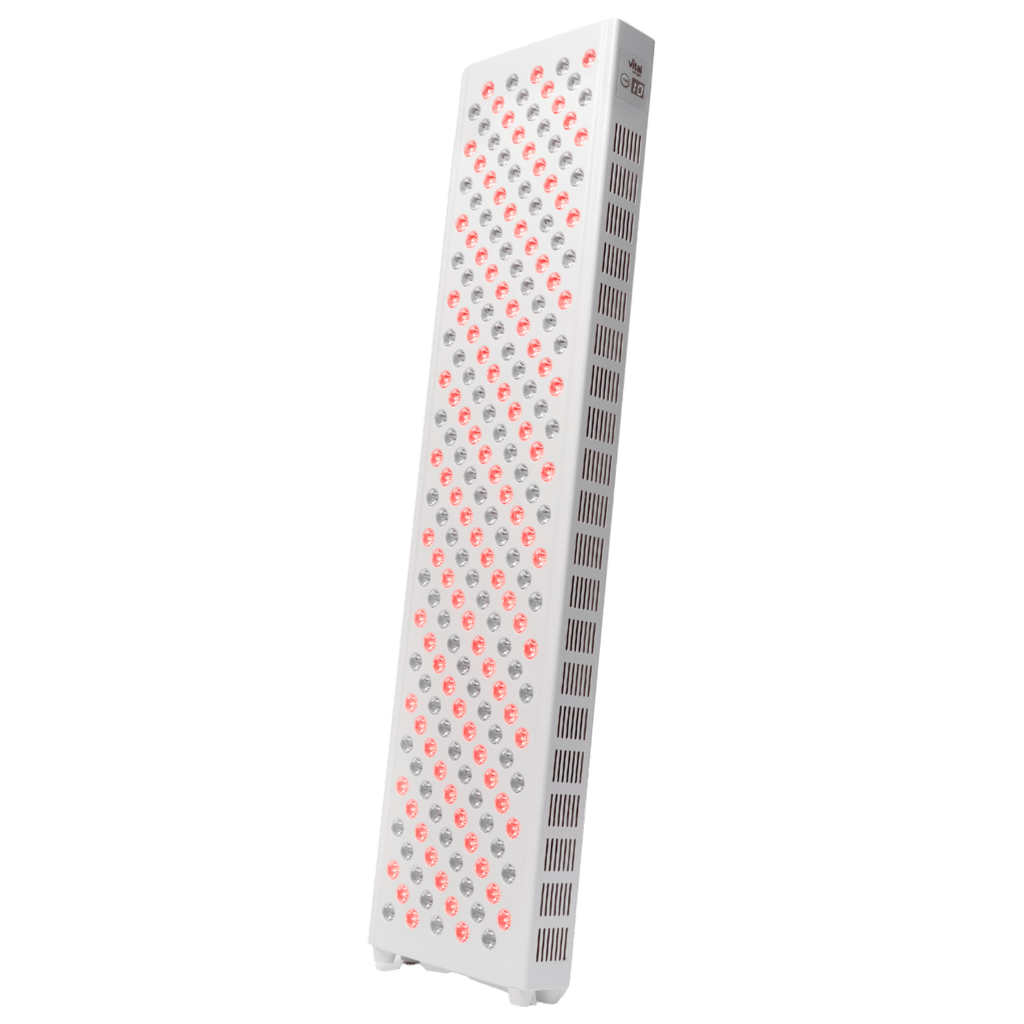 A vertical panel, essential for any red light therapy shop, boasts a grid of red and white bulbs. It's designed for therapeutic use and stands elegantly on small feet.